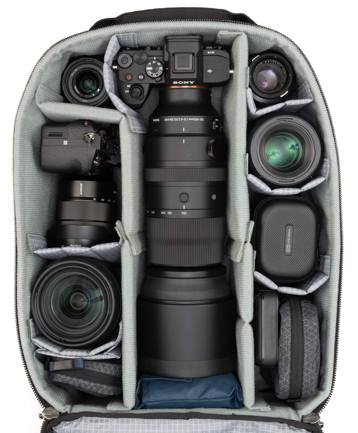 Think Tank Airport Commuter 31L loaded with Sony camera and telephoto lens
