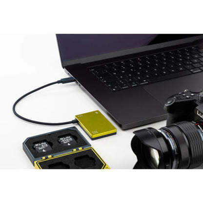 Angelbird SSD2GO PKT MK3 connected to a laptop with camera gear