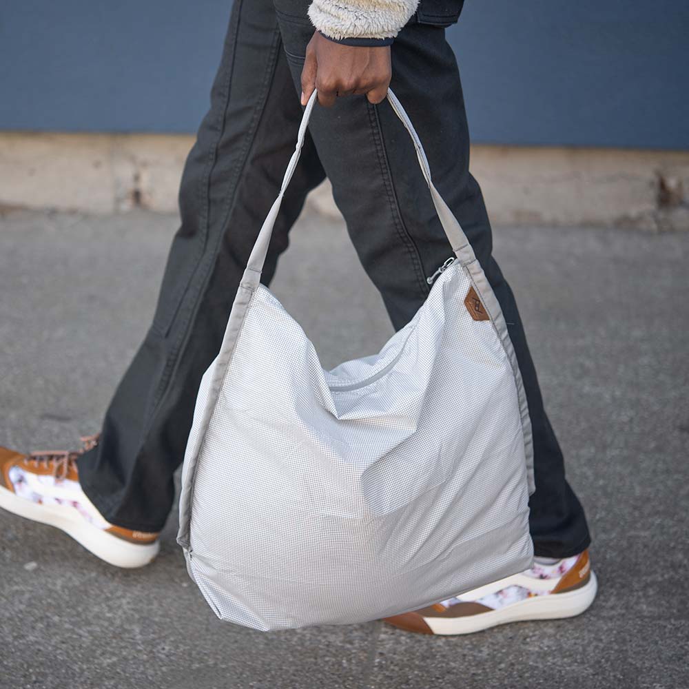 Peak Design Packable Tote carried by hand