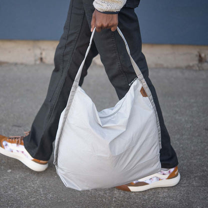 Peak Design Packable Tote carried by hand