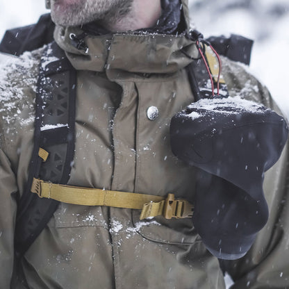 Peak Design Shell protecting a camera in snow