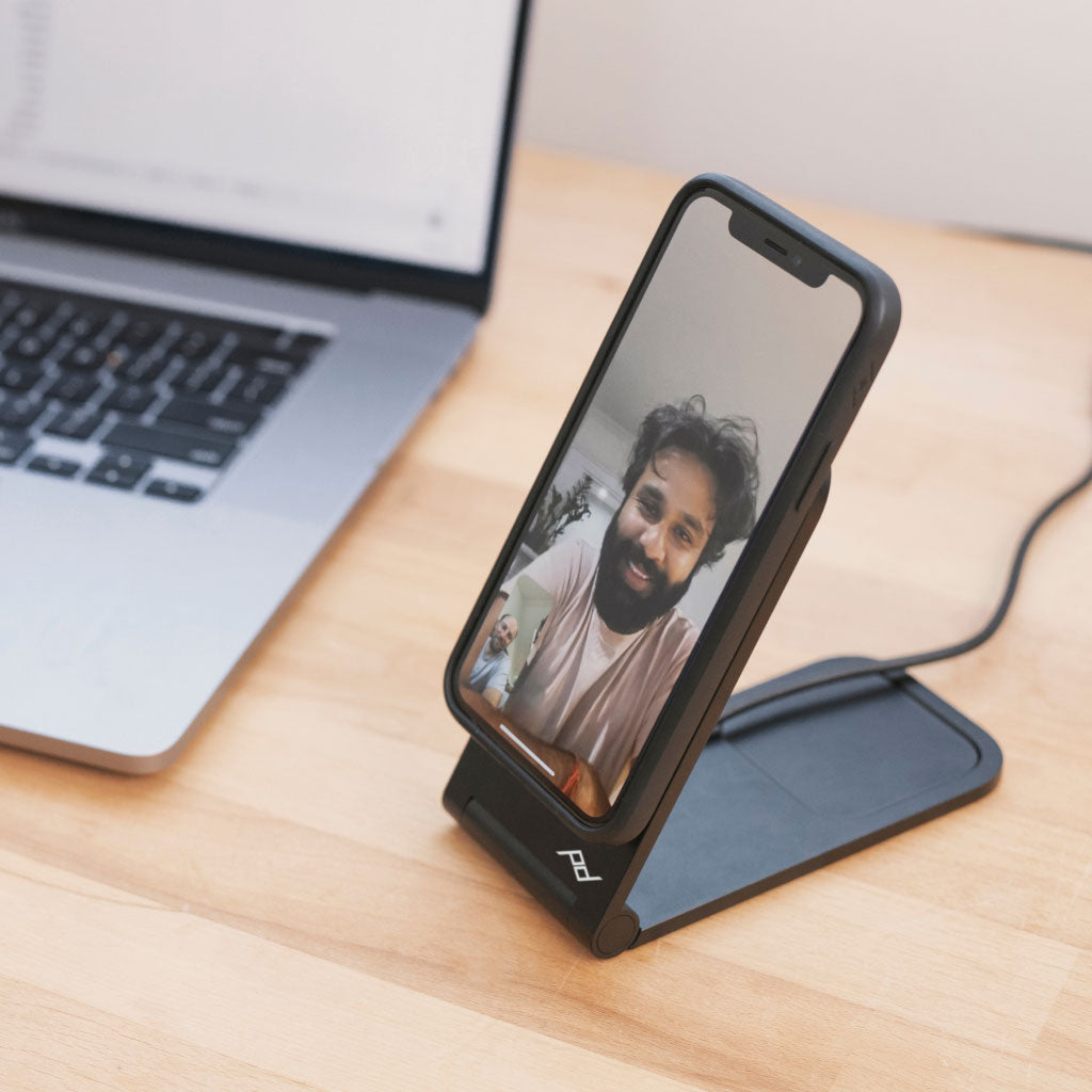 Peak Design Wireless Charging Stand in use for a video call