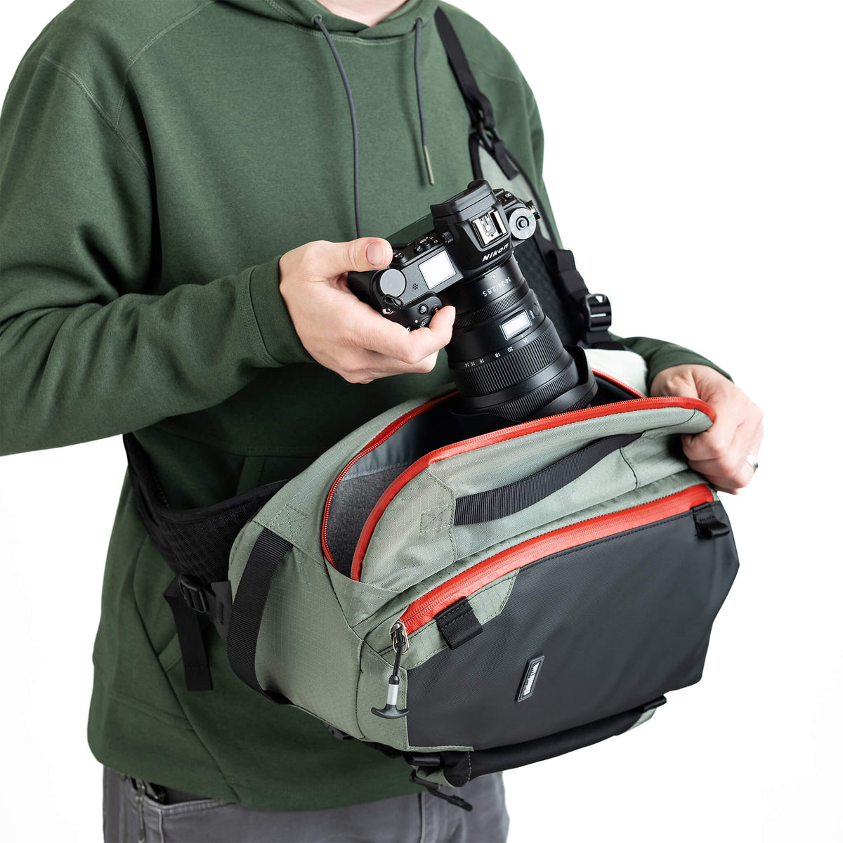 Think Tank PhotoCross 11L worn forward for fast camera access