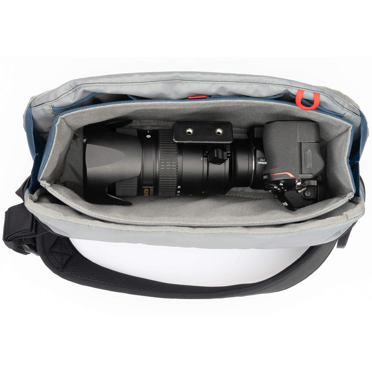 Think Tank PressPass Sling configured with a camera and 70-200mm lens